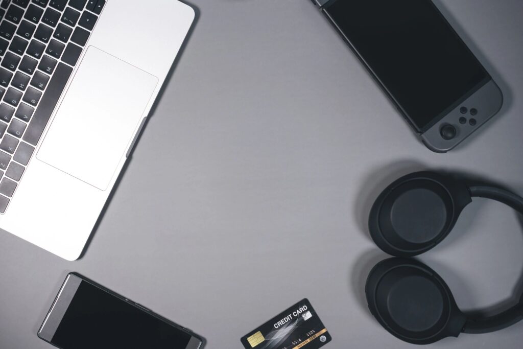 Top view of office table with digital technology lifestyles gadget and laptop keyboard with copy space