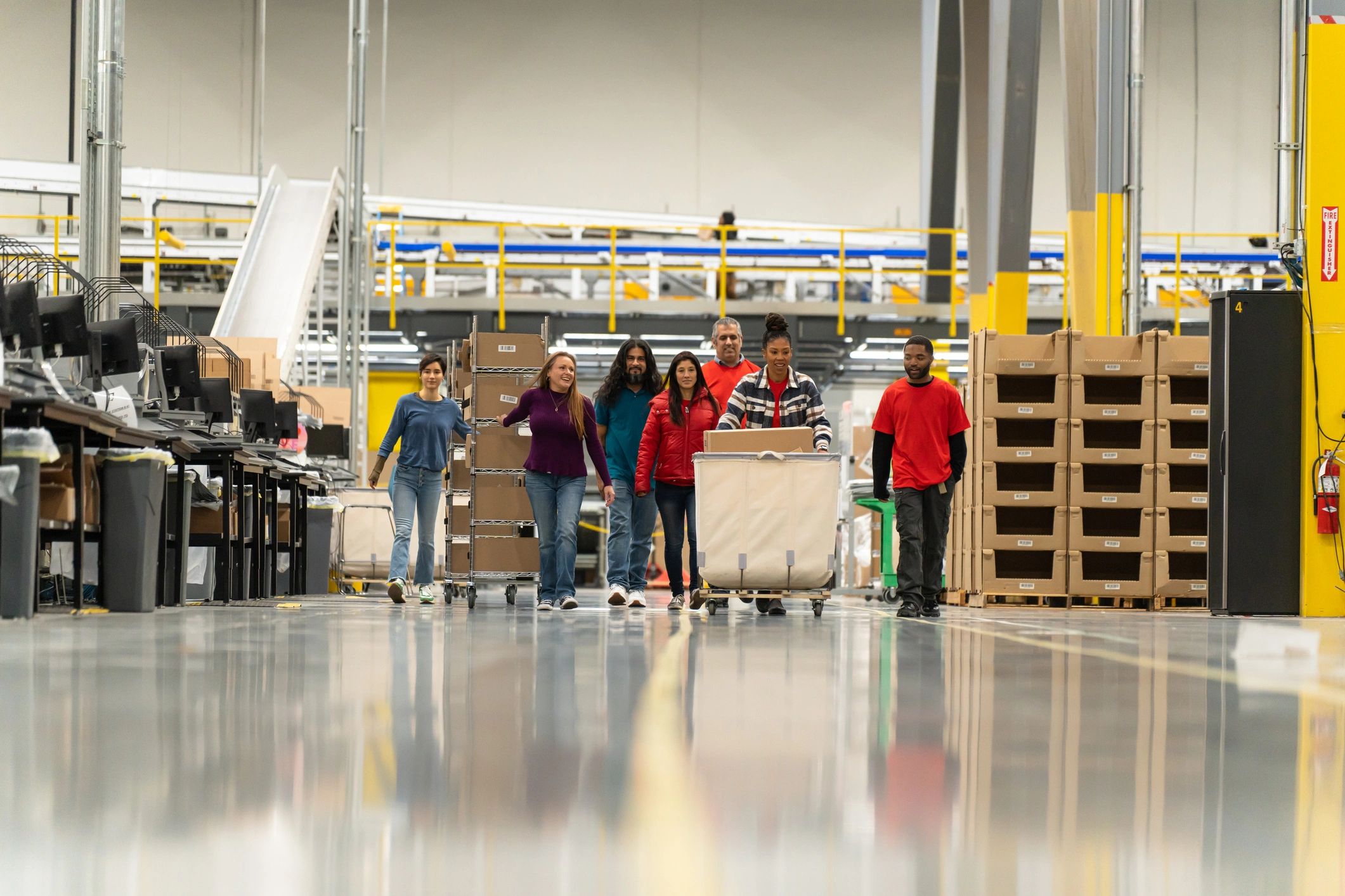 Fulfillment team moving inventory through a distribution center