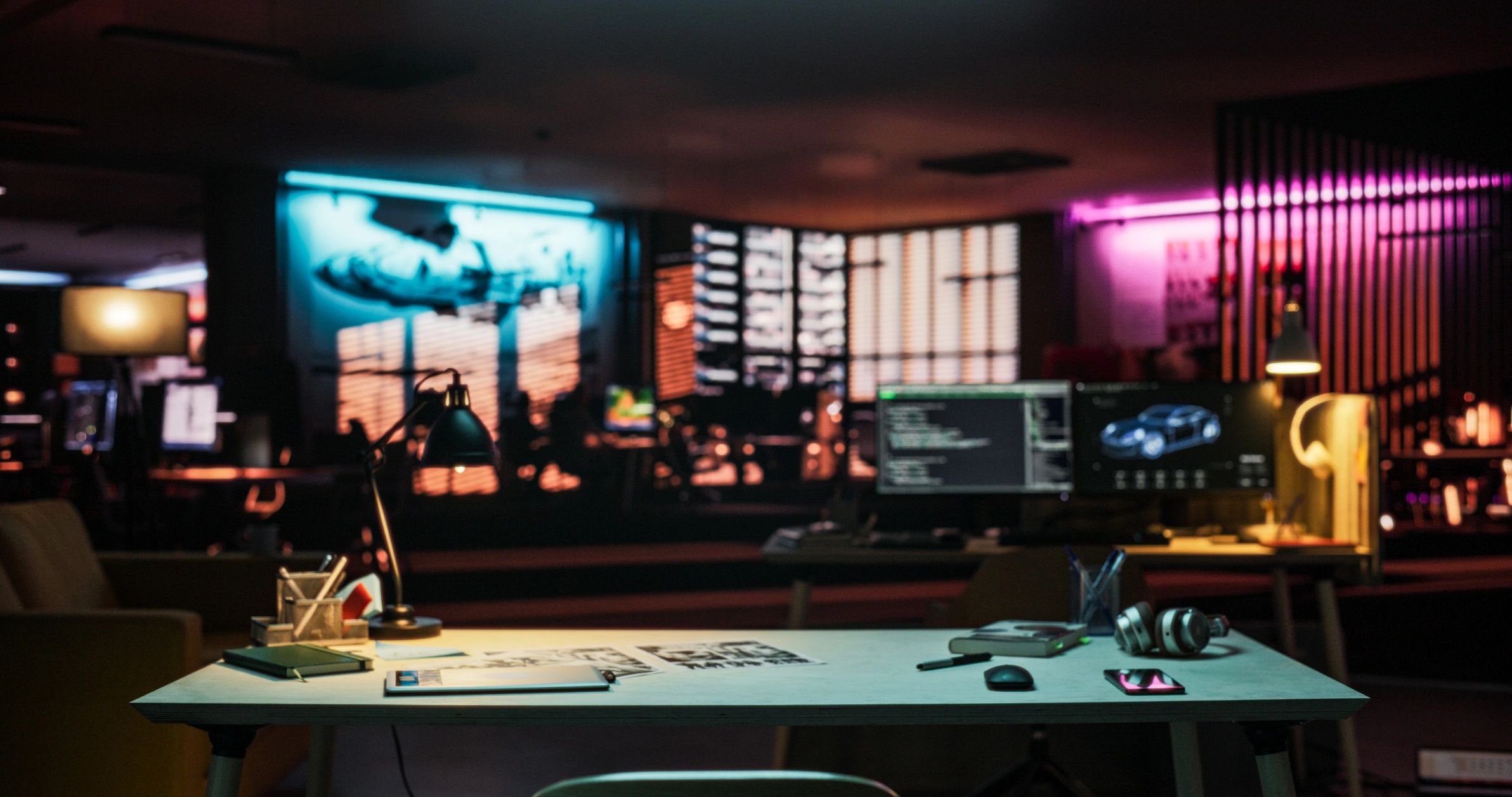 Neon-lit electronics and gaming desk setup