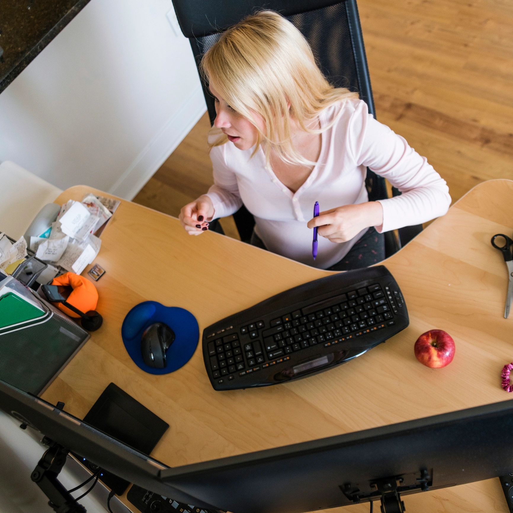 Store operations lead working at a desk